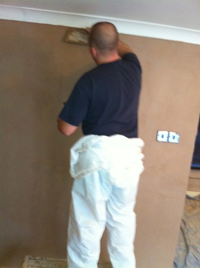 Experienced Plasterer skimming wall 